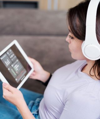 young-woman-in-headphones-looking-at-remote-4ZG96T5.jpg young-woman-in-headphones-looking-at-remote-4ZG96T5.jpg